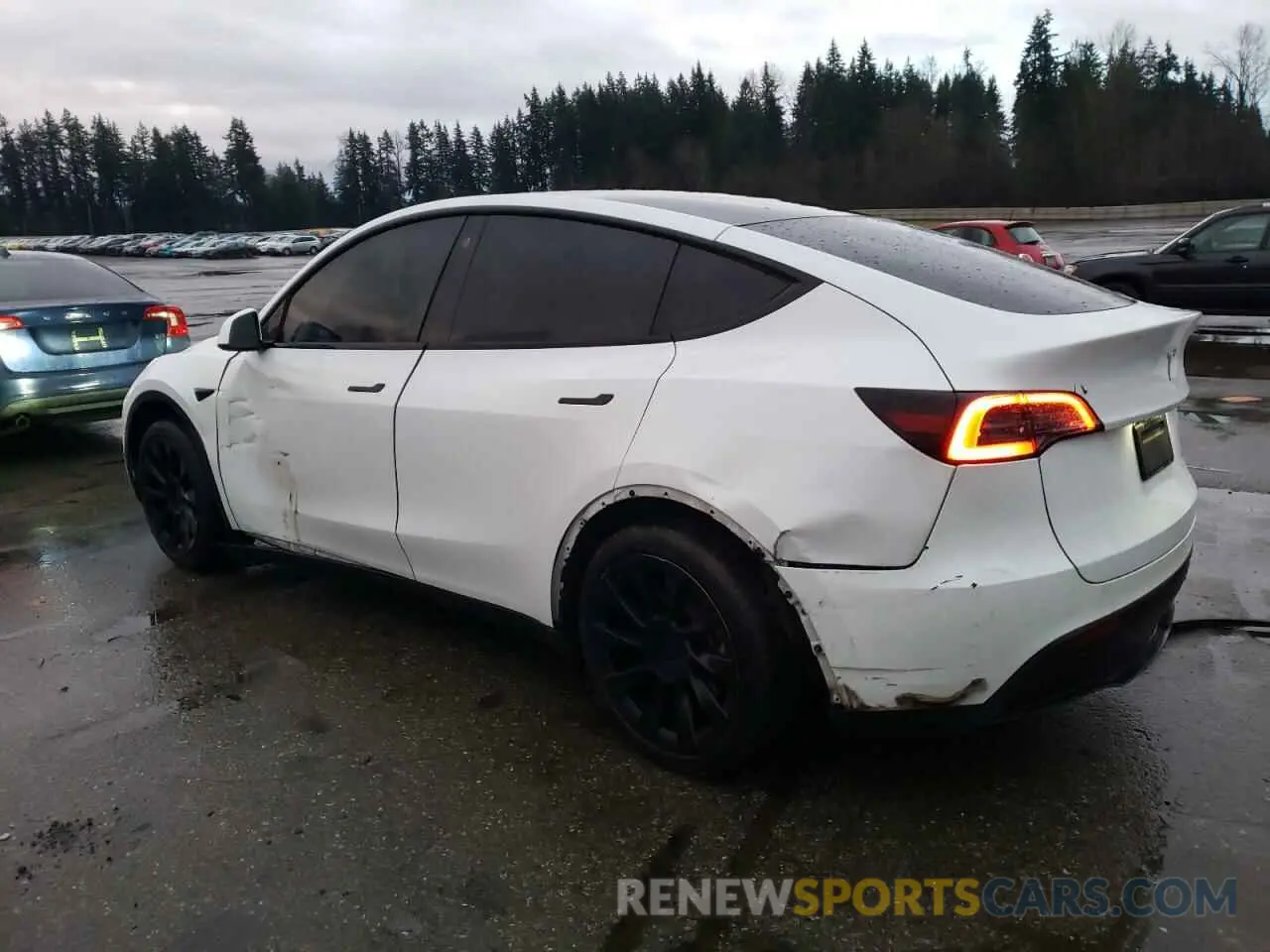 2 fotografías del automóvil dañado 7SAYGAEE4PF599993 TESLA MODEL Y 2023