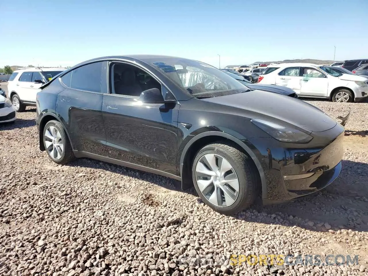 4 fotografías del automóvil dañado 7SAYGAEE4PF738942 TESLA MODEL Y 2023