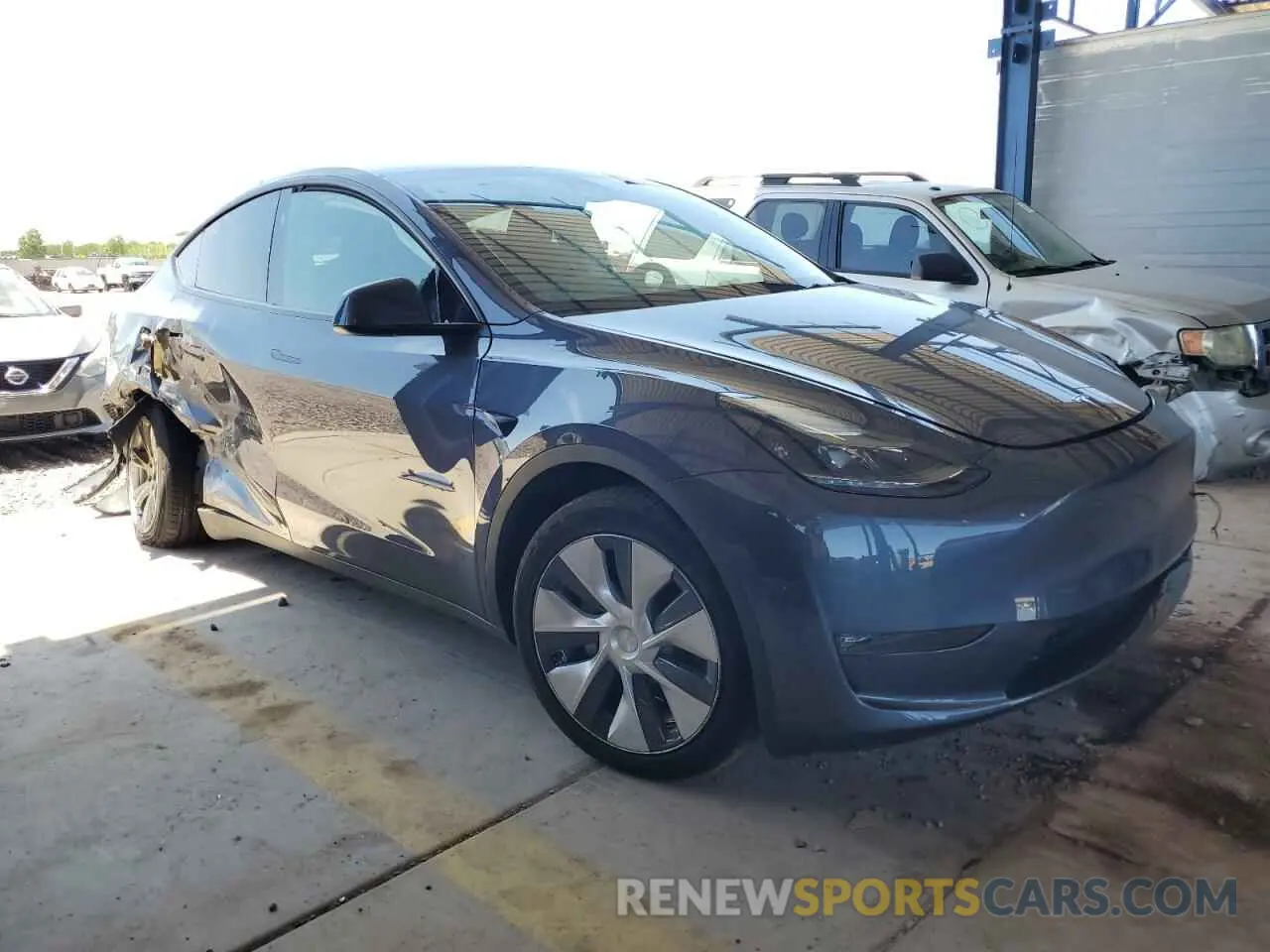 4 fotografías del automóvil dañado 7SAYGAEE4PF832044 TESLA MODEL Y 2023