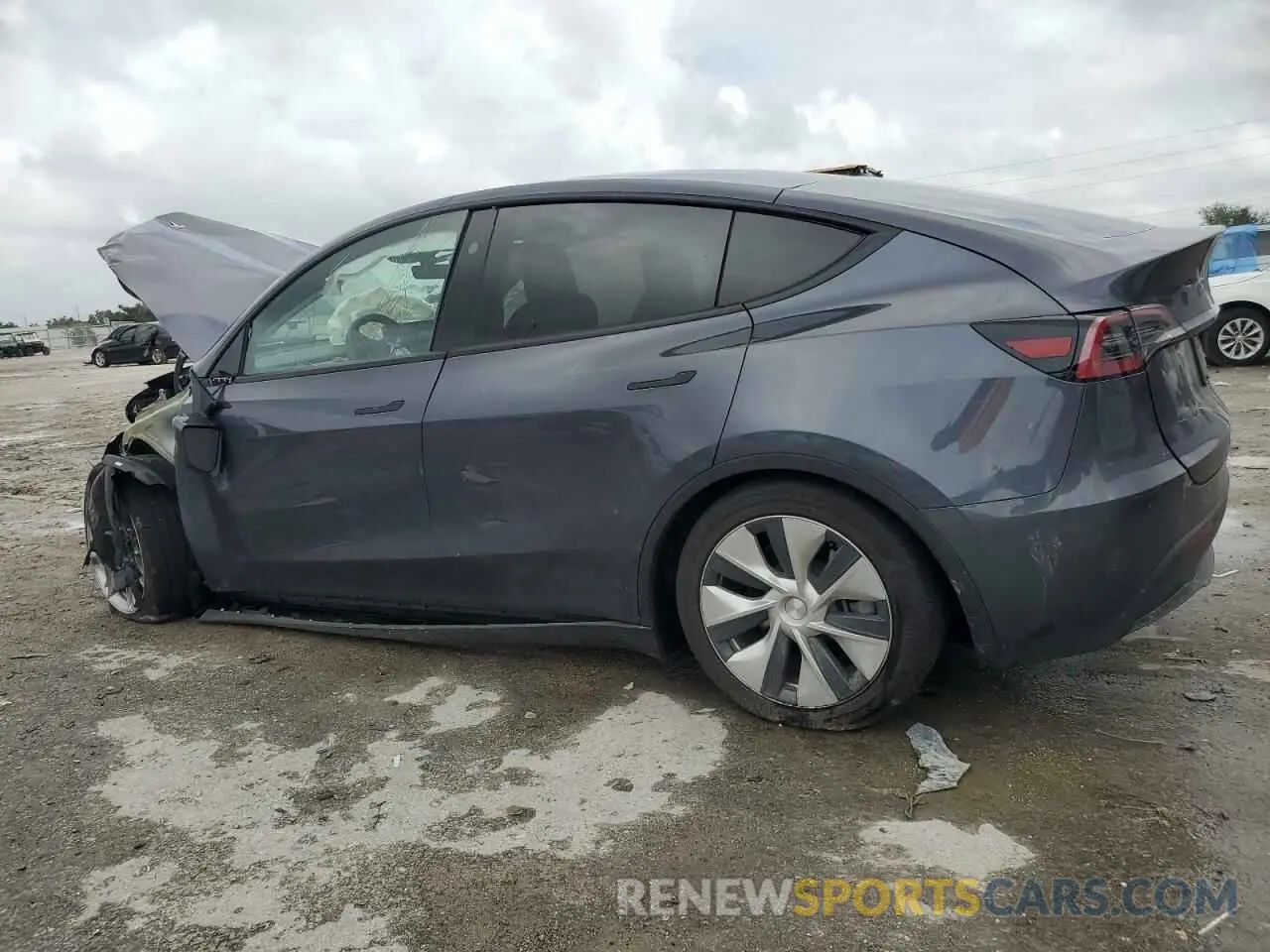 2 fotografías del automóvil dañado 7SAYGAEE4PF966567 TESLA MODEL Y 2023