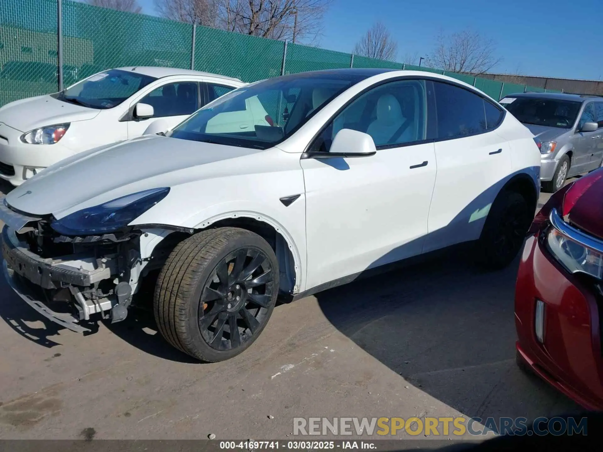 2 fotografías del automóvil dañado 7SAYGAEE5PF768791 TESLA MODEL Y 2023