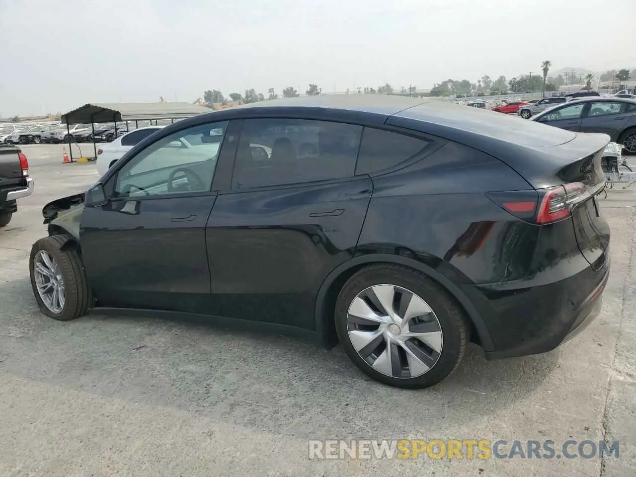 2 fotografías del automóvil dañado 7SAYGAEE5PF894603 TESLA MODEL Y 2023