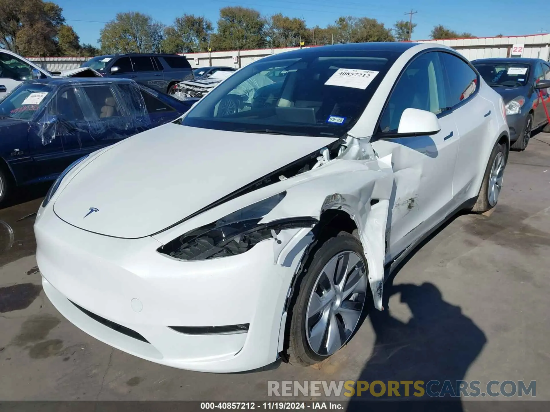2 fotografías del automóvil dañado 7SAYGAEE5PF904904 TESLA MODEL Y 2023