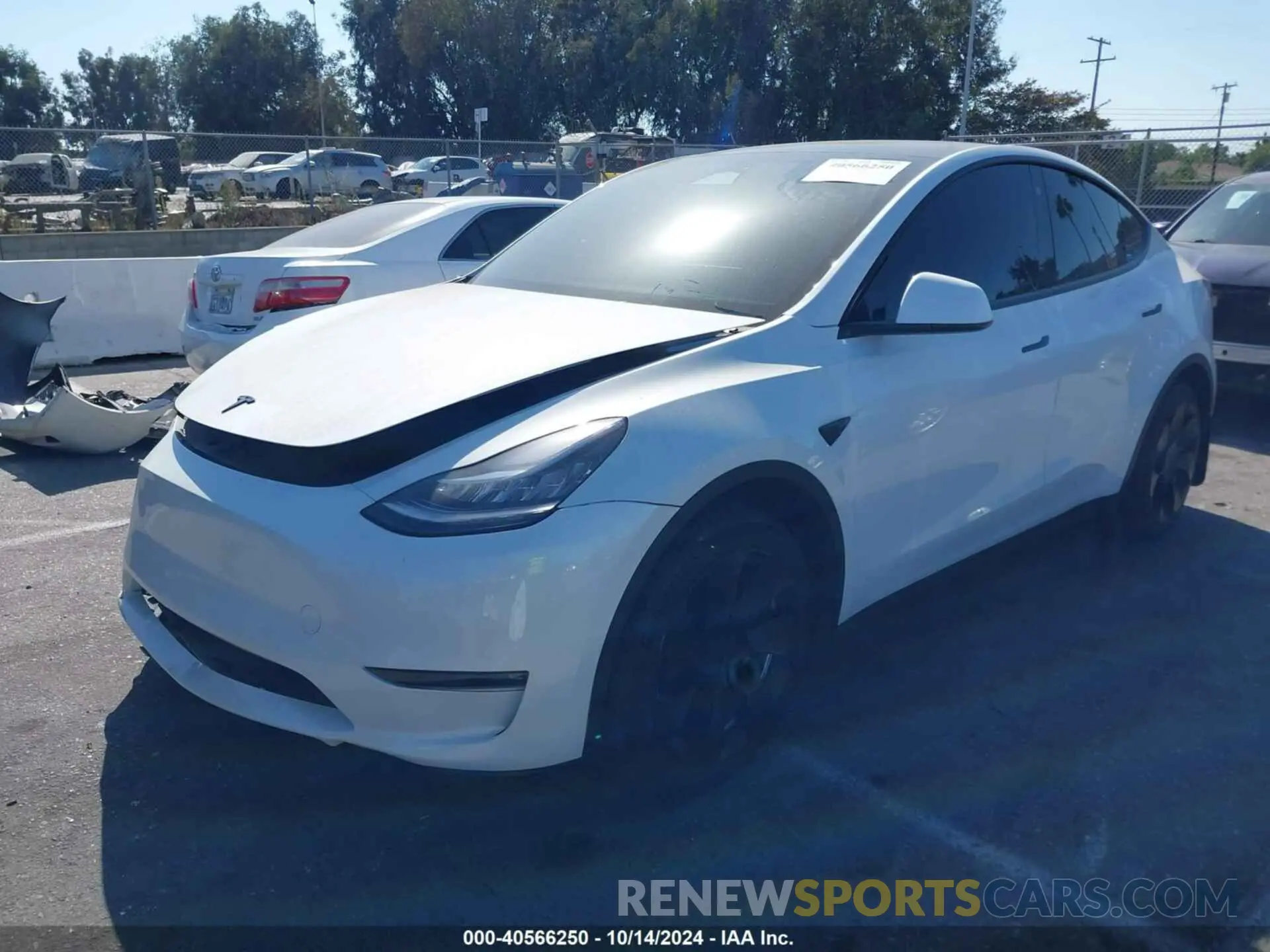 2 fotografías del automóvil dañado 7SAYGAEE6PF611528 TESLA MODEL Y 2023