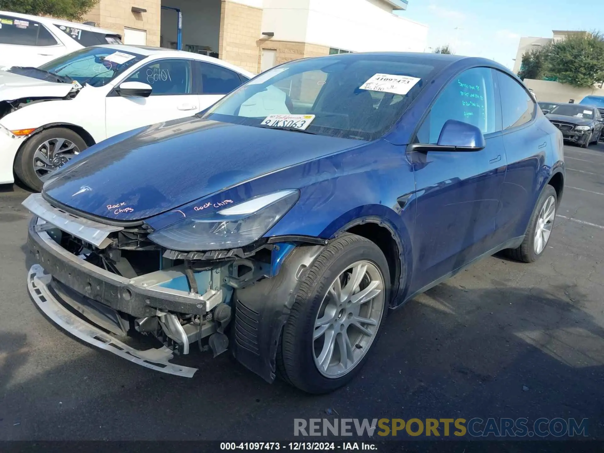2 fotografías del automóvil dañado 7SAYGAEE6PF892570 TESLA MODEL Y 2023