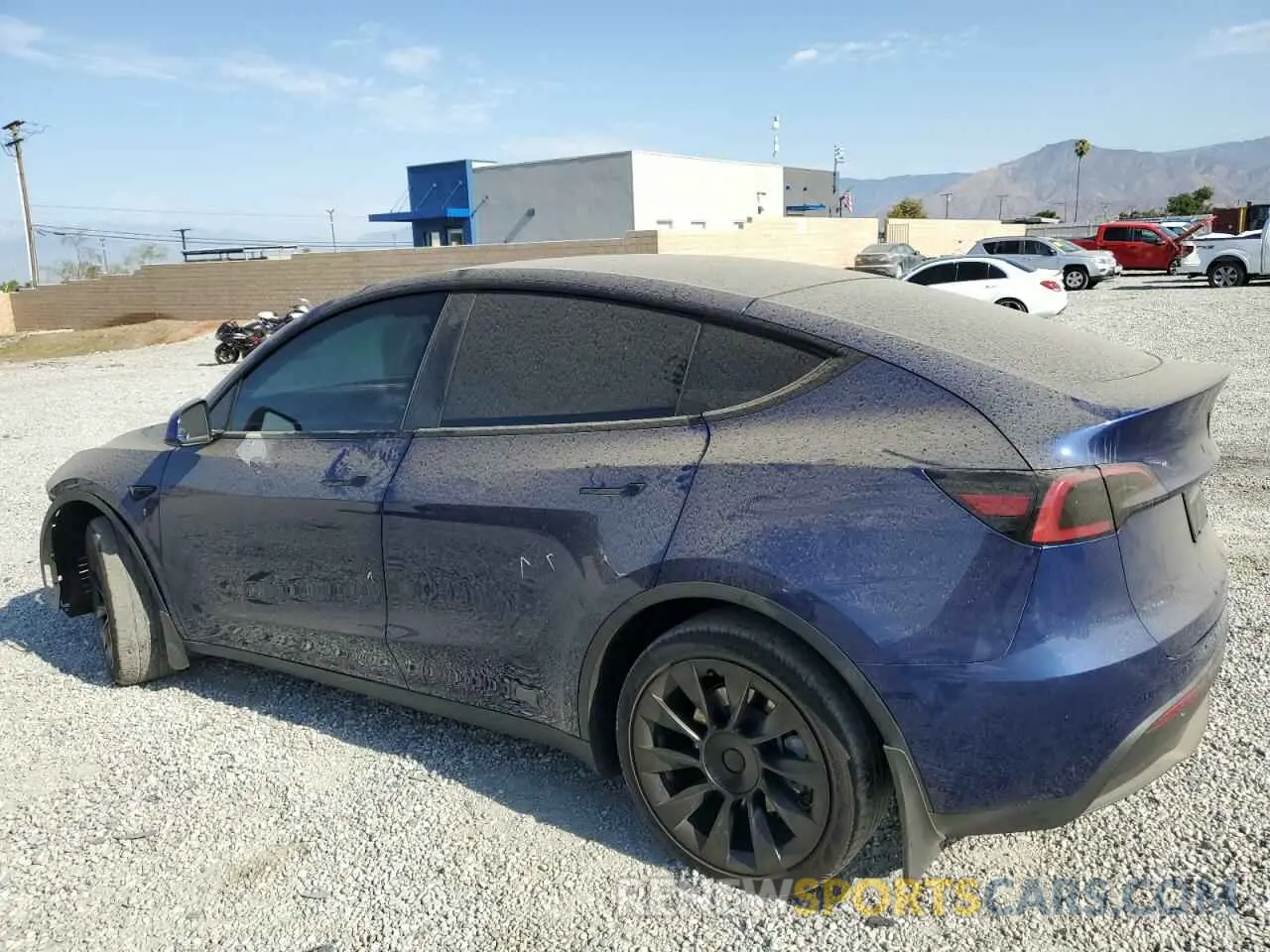2 fotografías del automóvil dañado 7SAYGAEE7PF596165 TESLA MODEL Y 2023