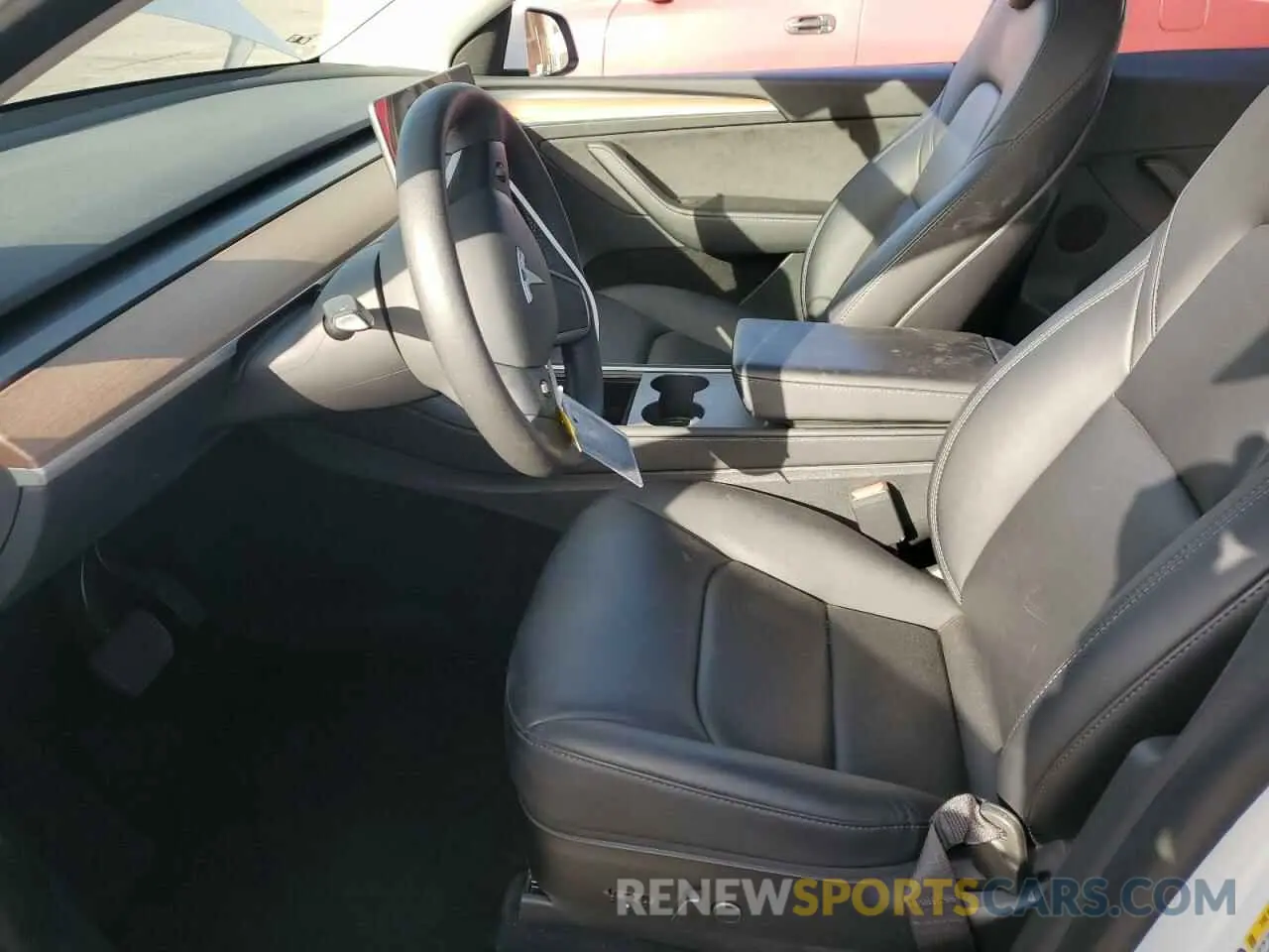 7 fotografías del automóvil dañado 7SAYGAEE7PF619170 TESLA MODEL Y 2023
