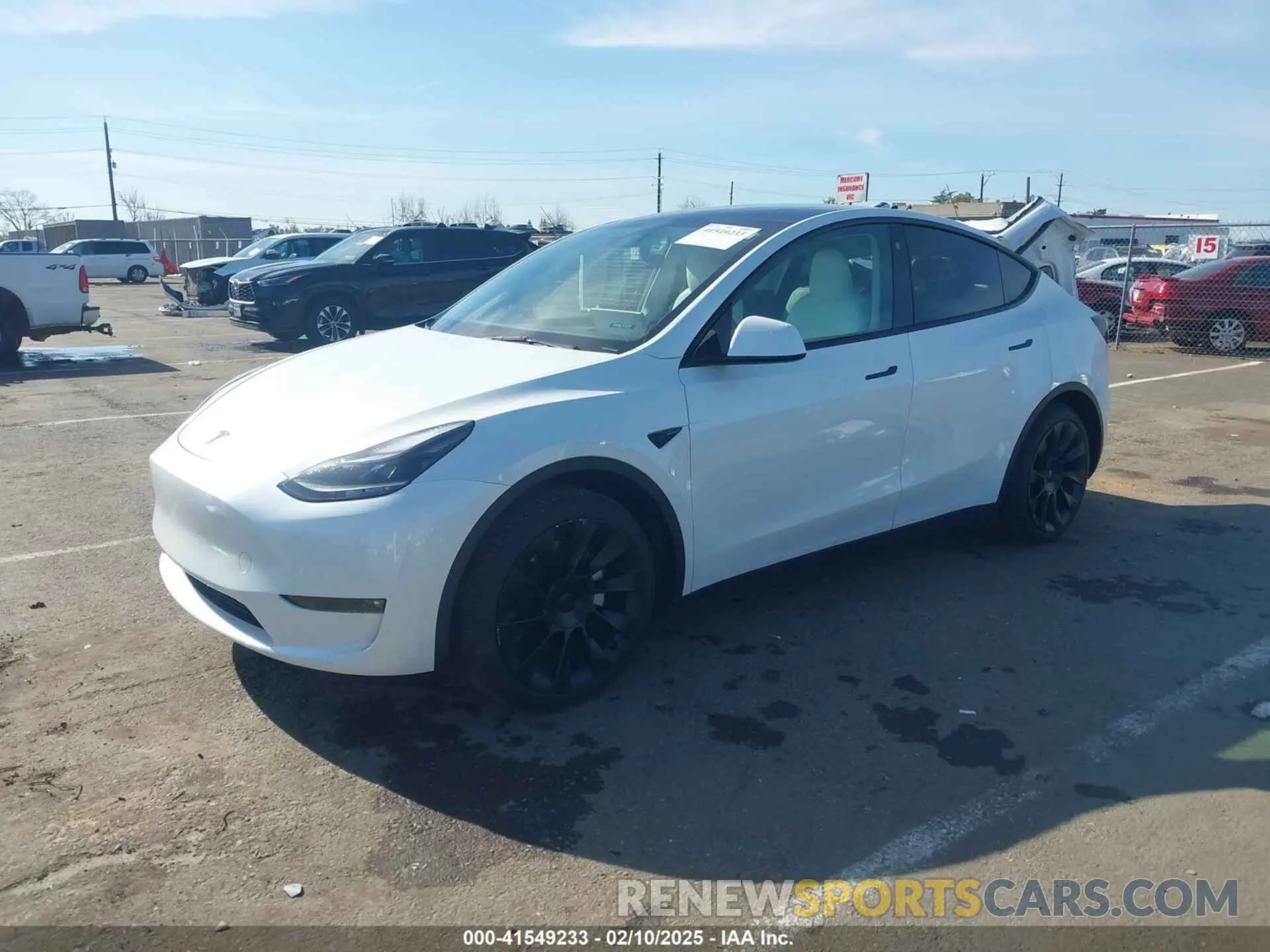 2 fotografías del automóvil dañado 7SAYGAEE7PF741155 TESLA MODEL Y 2023
