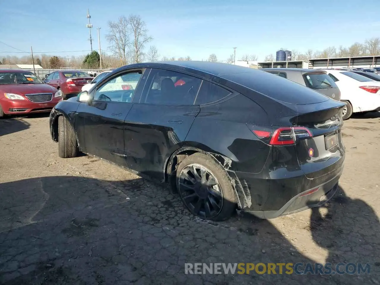 2 fotografías del automóvil dañado 7SAYGAEE7PF859030 TESLA MODEL Y 2023