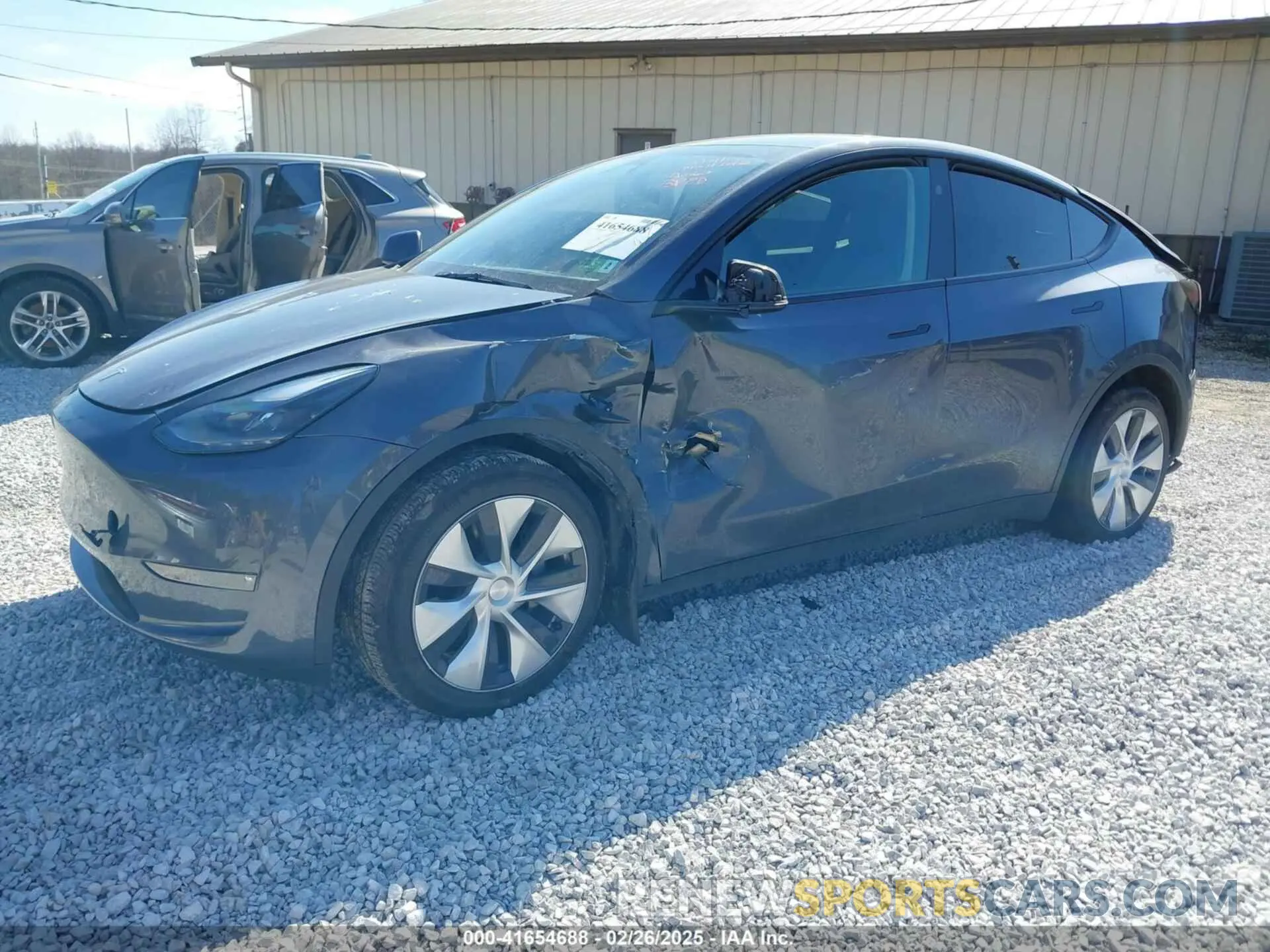 2 fotografías del automóvil dañado 7SAYGAEE7PF971620 TESLA MODEL Y 2023