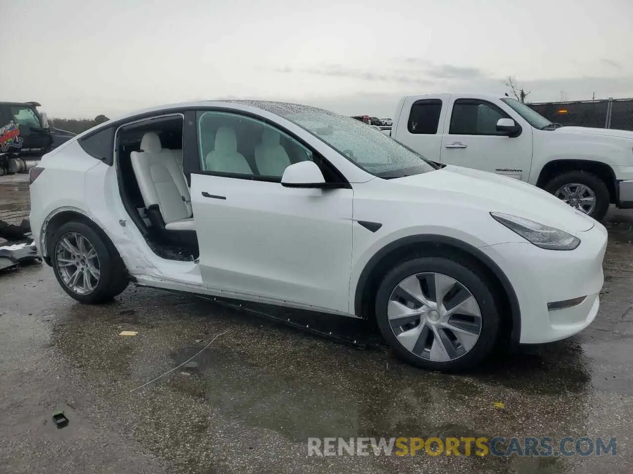 4 fotografías del automóvil dañado 7SAYGAEE8PF599740 TESLA MODEL Y 2023