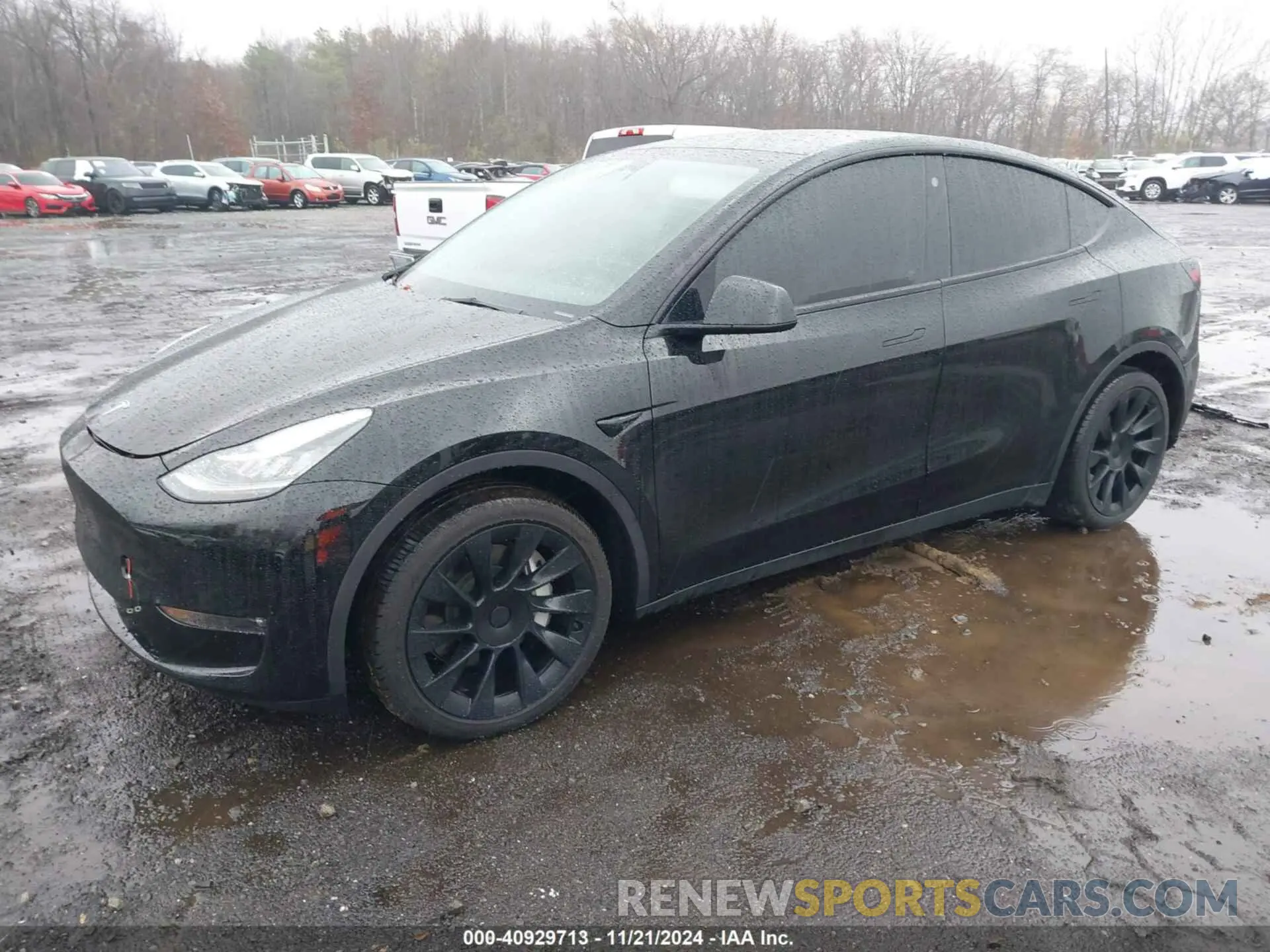 2 fotografías del automóvil dañado 7SAYGAEE8PF610509 TESLA MODEL Y 2023