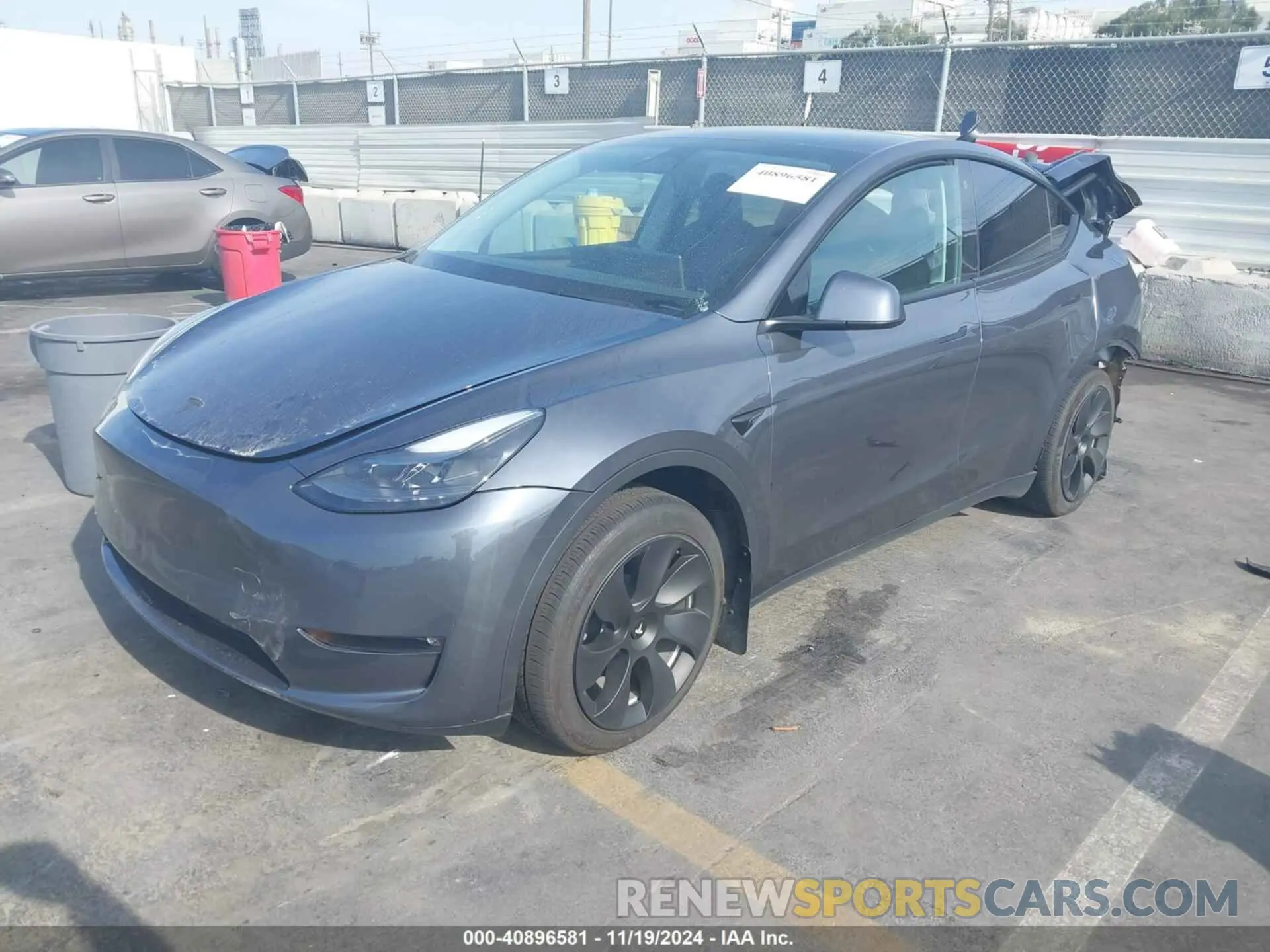 2 fotografías del automóvil dañado 7SAYGAEE8PF623860 TESLA MODEL Y 2023