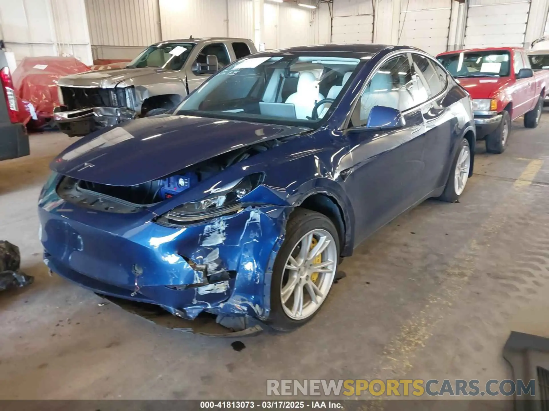 2 fotografías del automóvil dañado 7SAYGAEE8PF661220 TESLA MODEL Y 2023