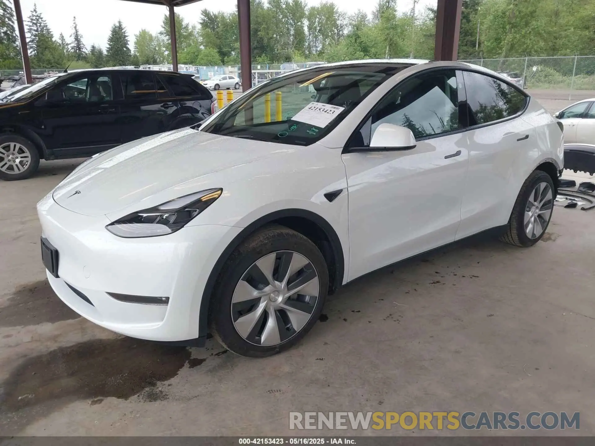 2 fotografías del automóvil dañado 7SAYGAEE8PF809009 TESLA MODEL Y 2023