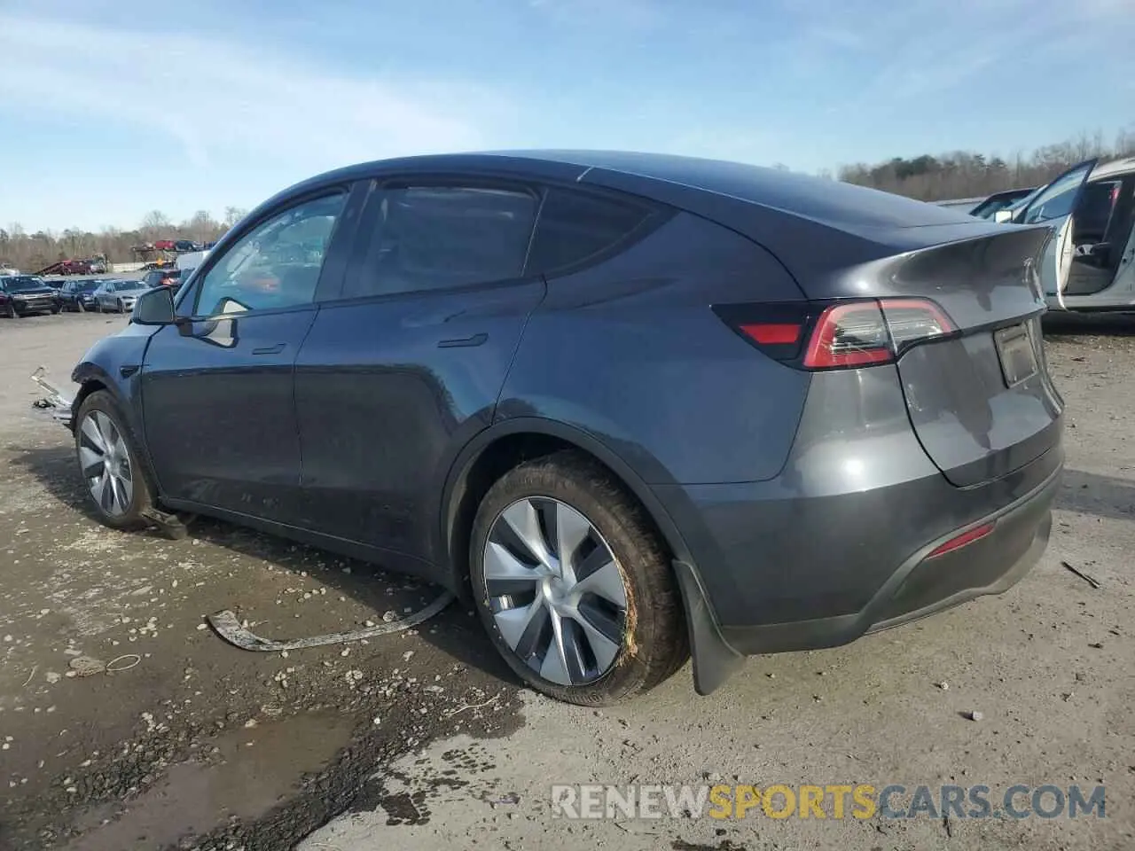 2 fotografías del automóvil dañado 7SAYGAEE8PF902046 TESLA MODEL Y 2023