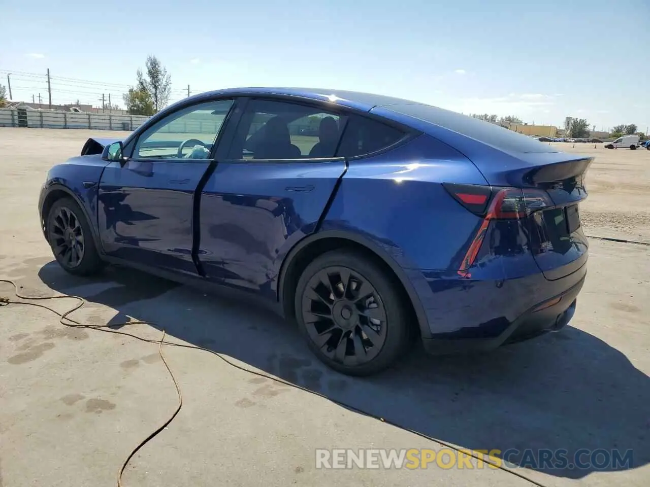 2 fotografías del automóvil dañado 7SAYGAEE9PF709792 TESLA MODEL Y 2023