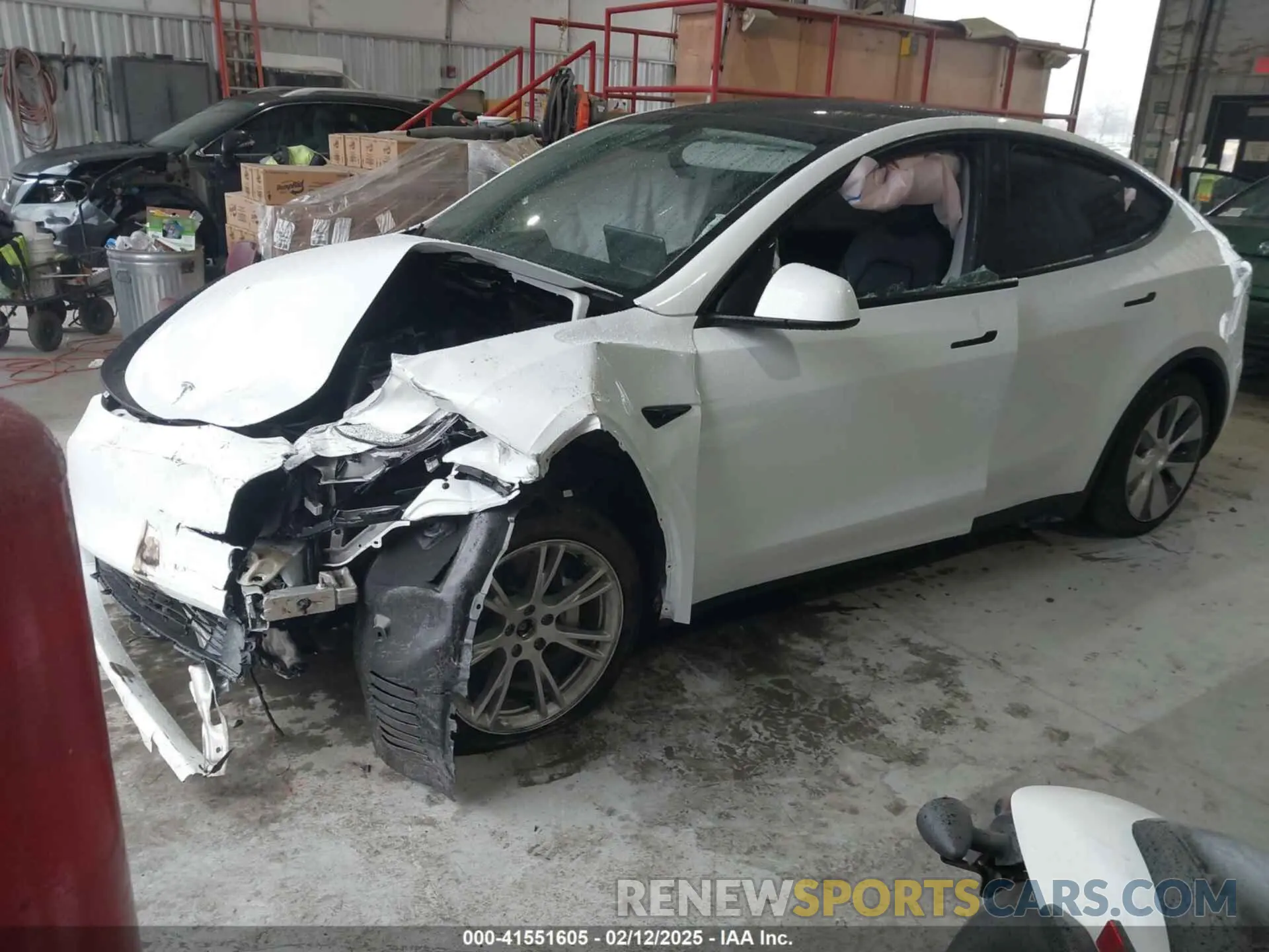 2 fotografías del automóvil dañado 7SAYGAEEXPF789037 TESLA MODEL Y 2023