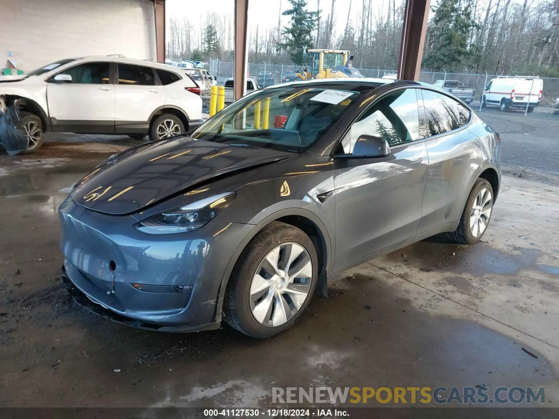 2 fotografías del automóvil dañado 7SAYGDED0PF963061 TESLA MODEL Y 2023