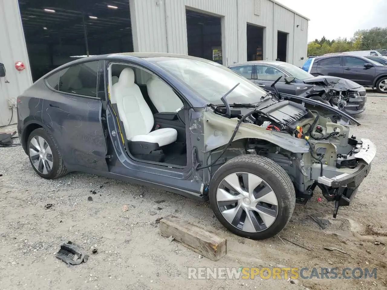 4 fotografías del automóvil dañado 7SAYGDED1PF913589 TESLA MODEL Y 2023