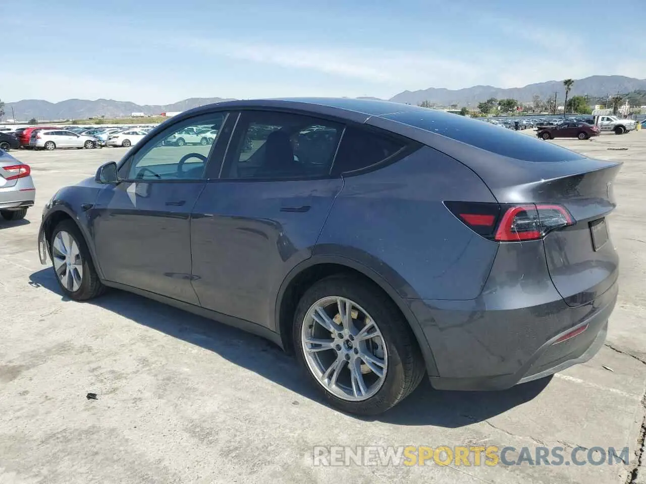 2 fotografías del automóvil dañado 7SAYGDED1PF934944 TESLA MODEL Y 2023