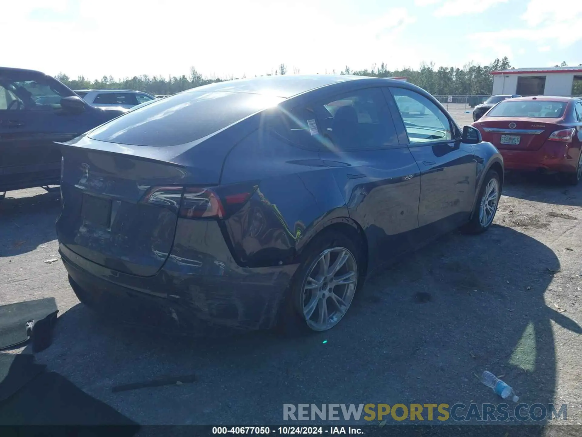 4 fotografías del automóvil dañado 7SAYGDED2PF947136 TESLA MODEL Y 2023