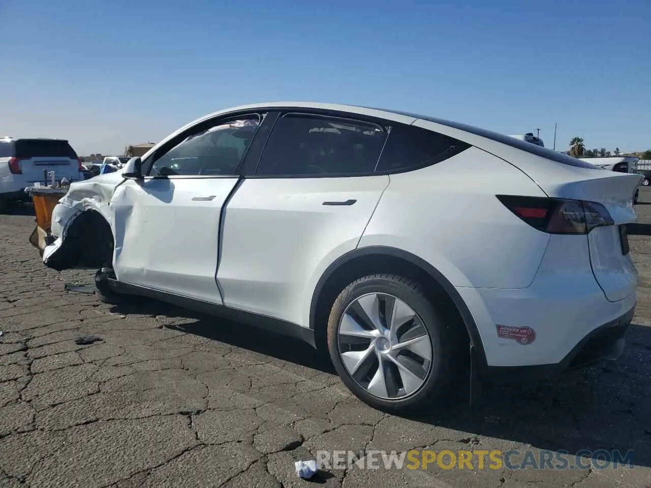 2 fotografías del automóvil dañado 7SAYGDED3PF962910 TESLA MODEL Y 2023