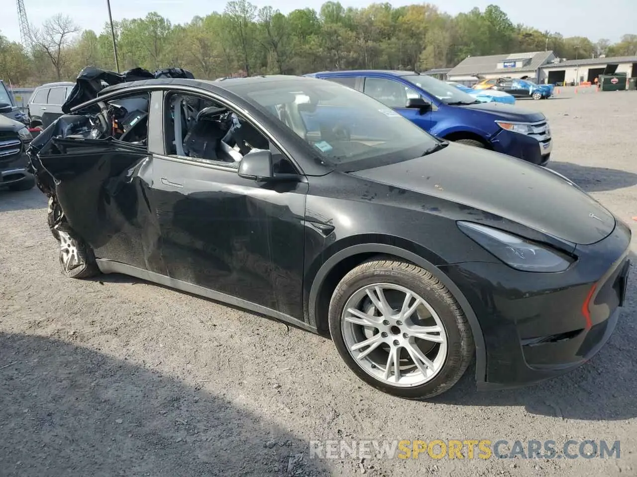 4 fotografías del automóvil dañado 7SAYGDED4PF931181 TESLA MODEL Y 2023