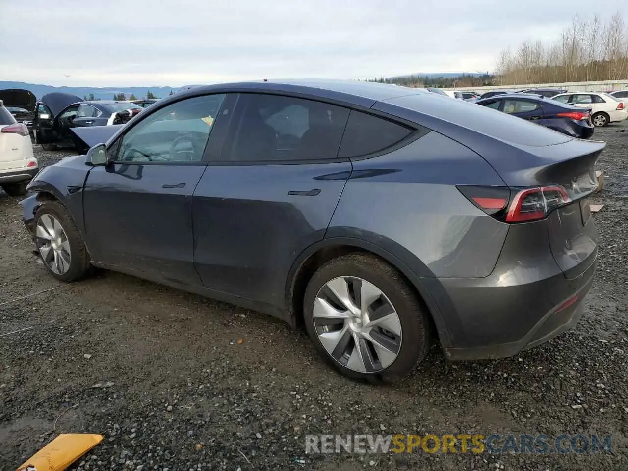 2 fotografías del automóvil dañado 7SAYGDED8PF934679 TESLA MODEL Y 2023