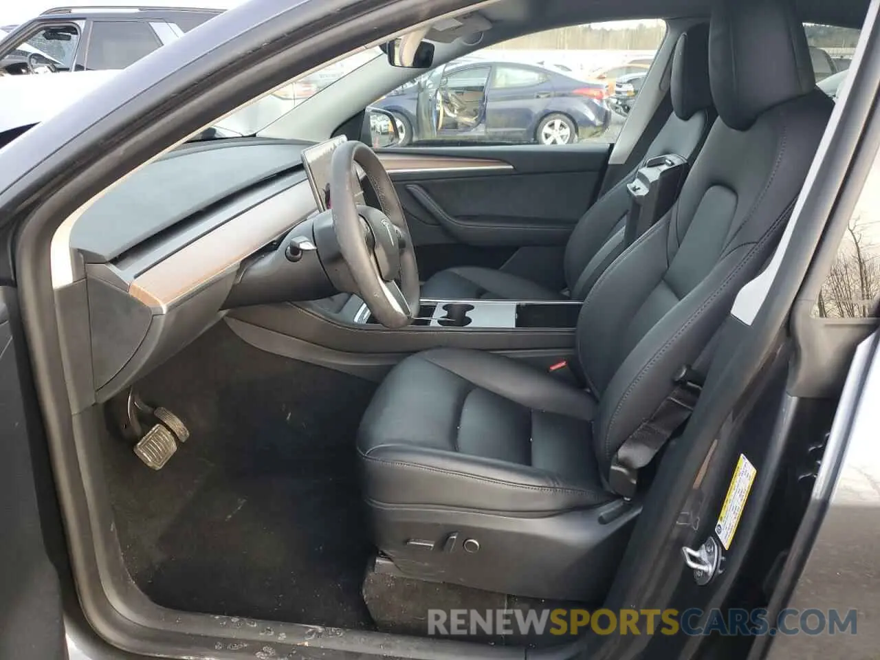7 fotografías del automóvil dañado 7SAYGDED8PF934679 TESLA MODEL Y 2023