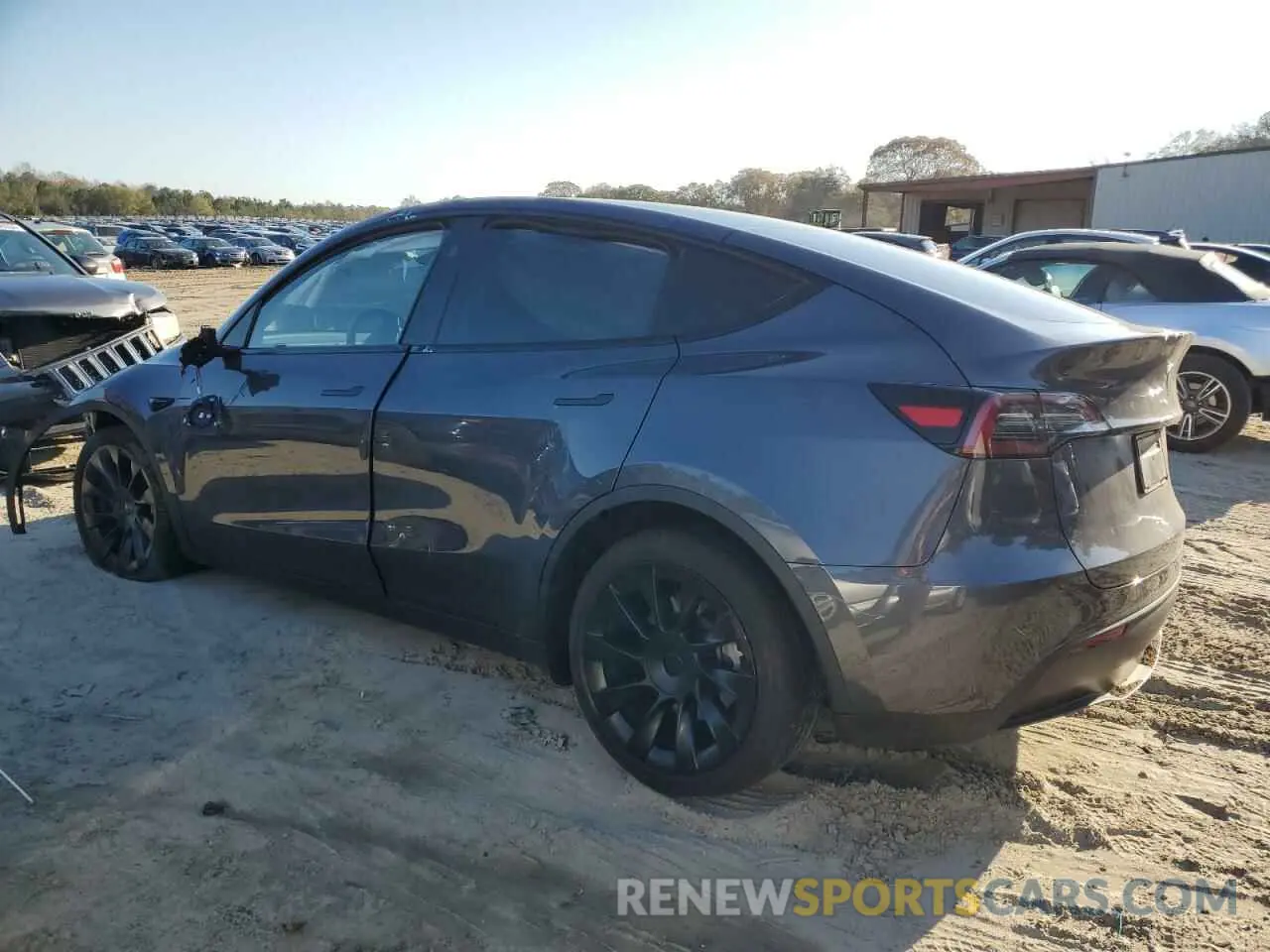 2 fotografías del automóvil dañado 7SAYGDED8PF957265 TESLA MODEL Y 2023