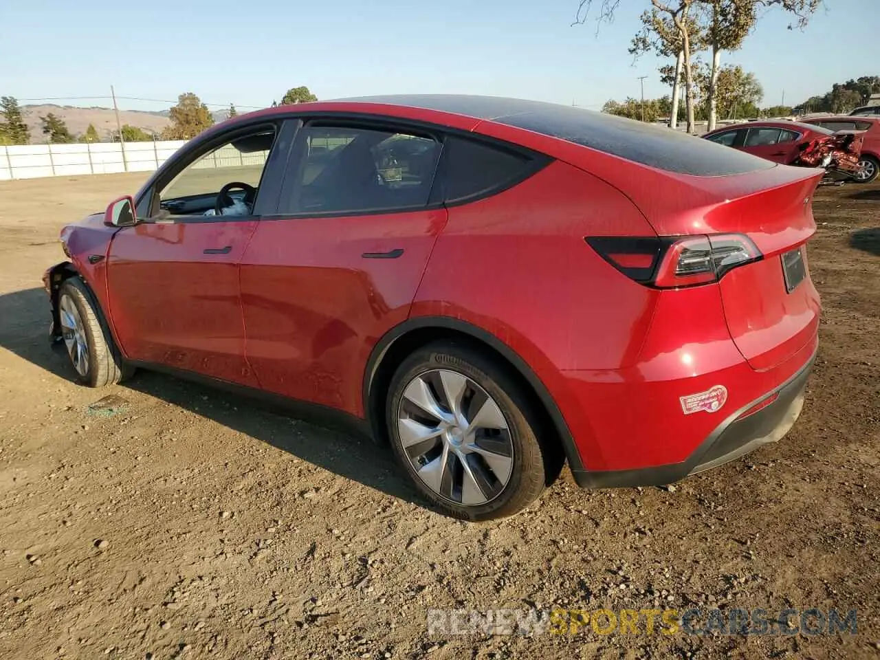 2 fotografías del automóvil dañado 7SAYGDED8PF971795 TESLA MODEL Y 2023