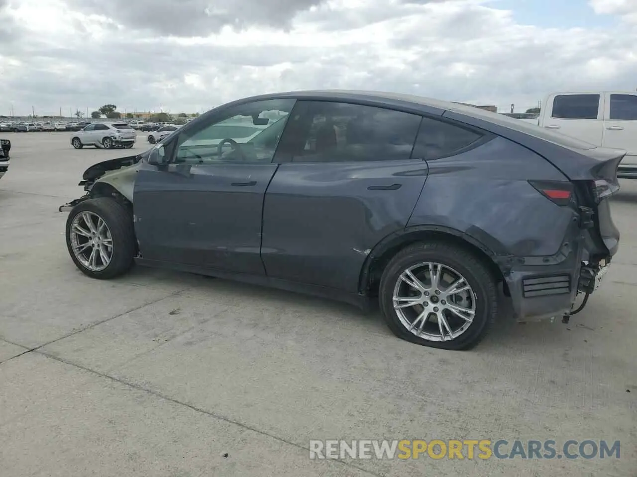 2 fotografías del automóvil dañado 7SAYGDED9PF965231 TESLA MODEL Y 2023