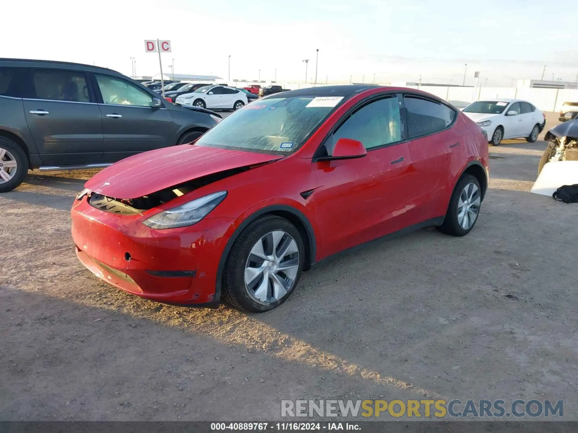 2 fotografías del automóvil dañado 7SAYGDEE0PA030735 TESLA MODEL Y 2023
