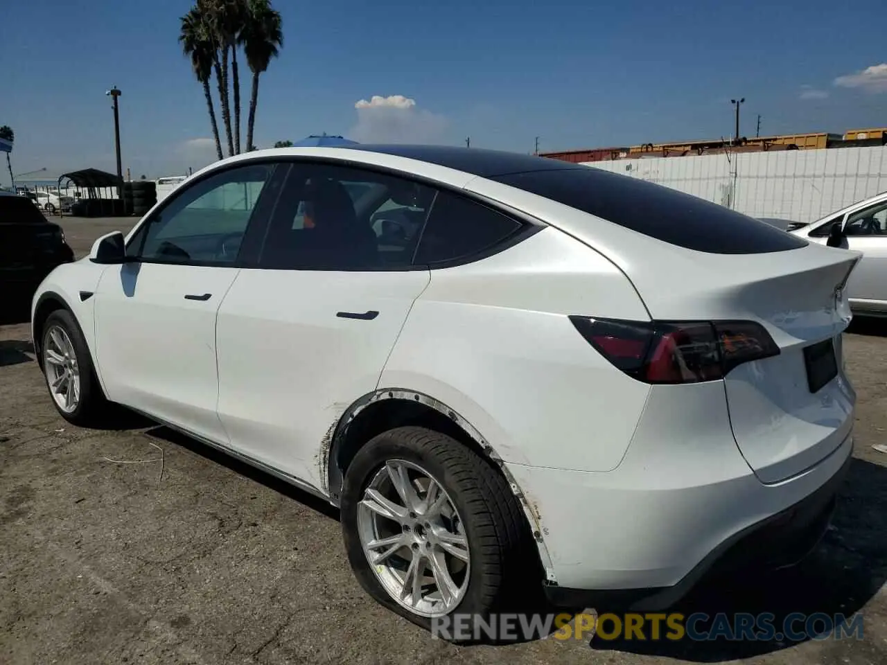 2 fotografías del automóvil dañado 7SAYGDEE0PA037684 TESLA MODEL Y 2023