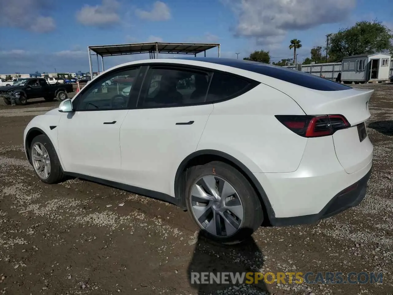 2 fotografías del automóvil dañado 7SAYGDEE0PA037829 TESLA MODEL Y 2023