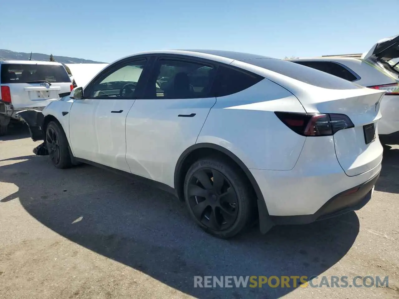 2 fotografías del automóvil dañado 7SAYGDEE0PA097545 TESLA MODEL Y 2023