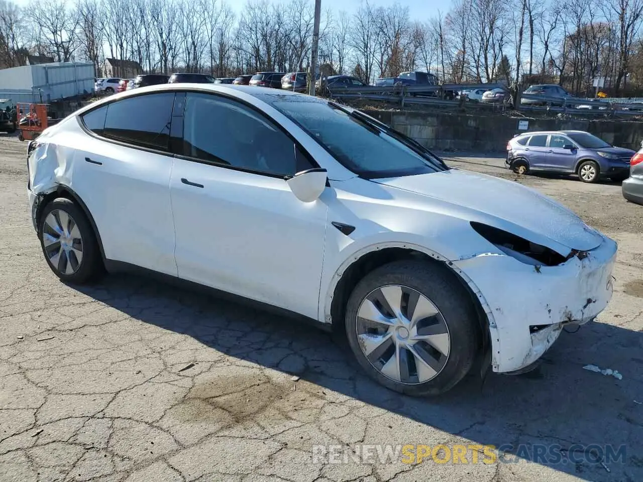 4 fotografías del automóvil dañado 7SAYGDEE0PA128065 TESLA MODEL Y 2023