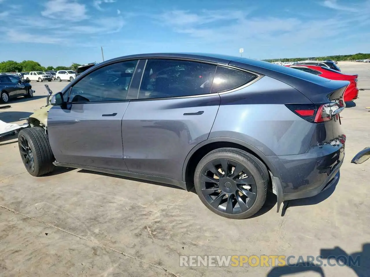 2 fotografías del automóvil dañado 7SAYGDEE0PA152477 TESLA MODEL Y 2023