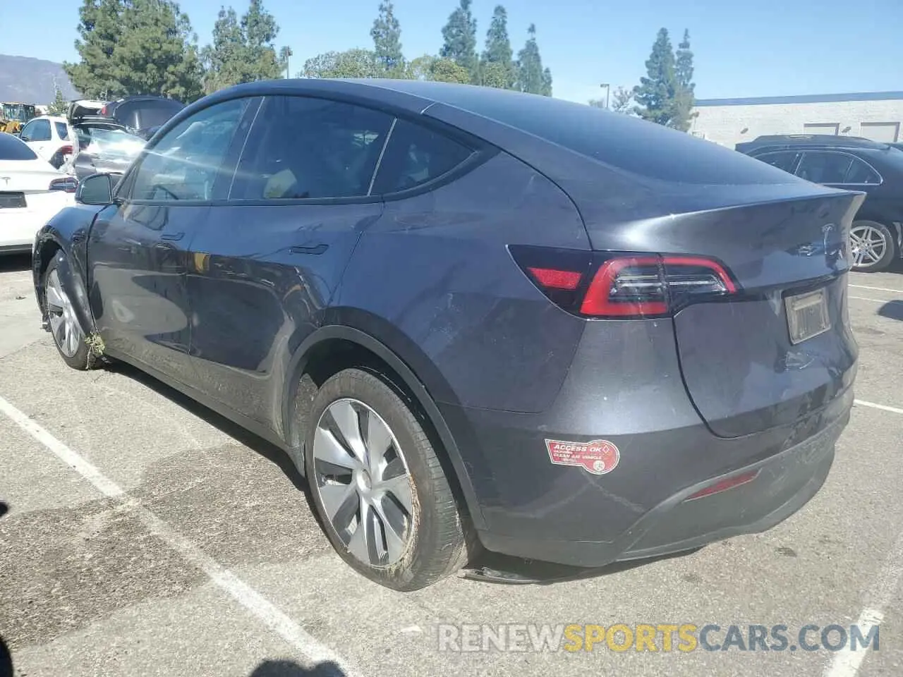 2 fotografías del automóvil dañado 7SAYGDEE0PA177797 TESLA MODEL Y 2023