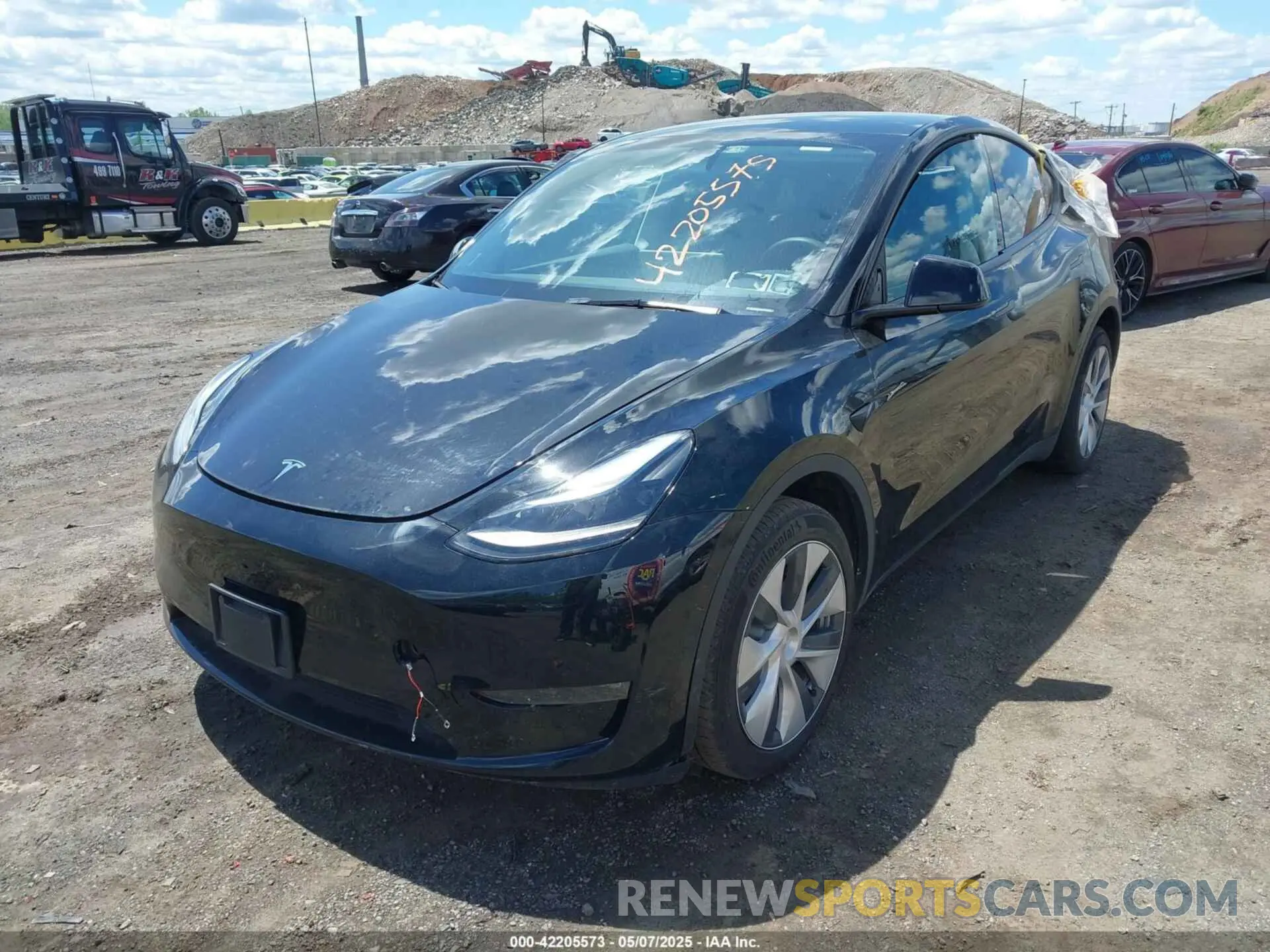 2 fotografías del automóvil dañado 7SAYGDEE0PA183891 TESLA MODEL Y 2023