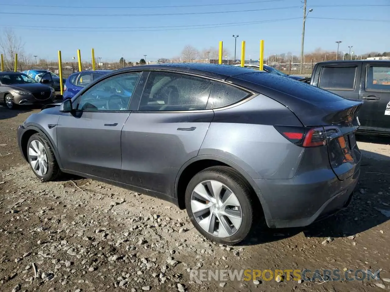 2 fotografías del automóvil dañado 7SAYGDEE0PA206005 TESLA MODEL Y 2023