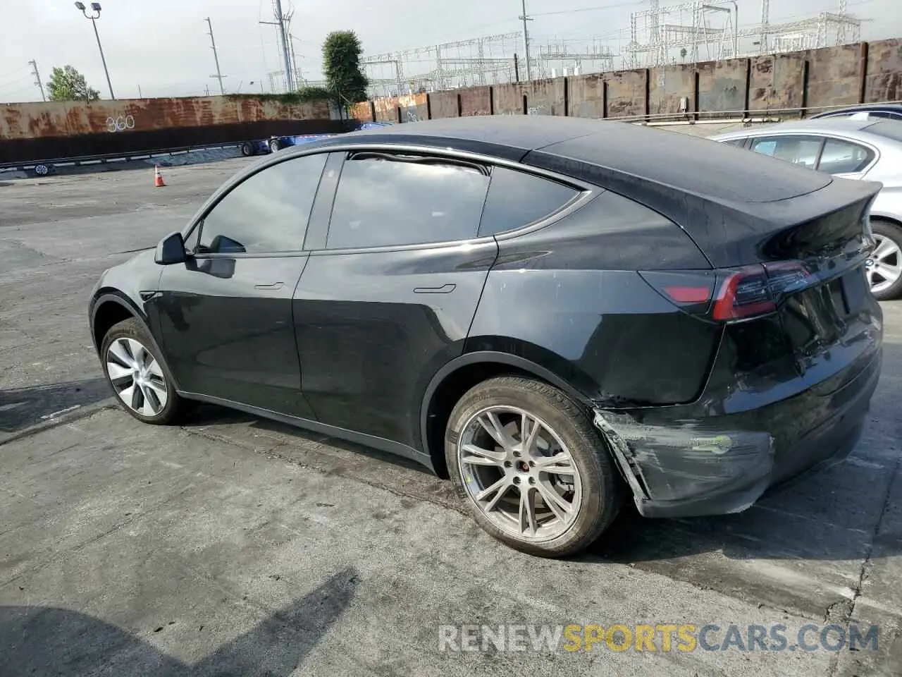 2 fotografías del automóvil dañado 7SAYGDEE0PF637804 TESLA MODEL Y 2023