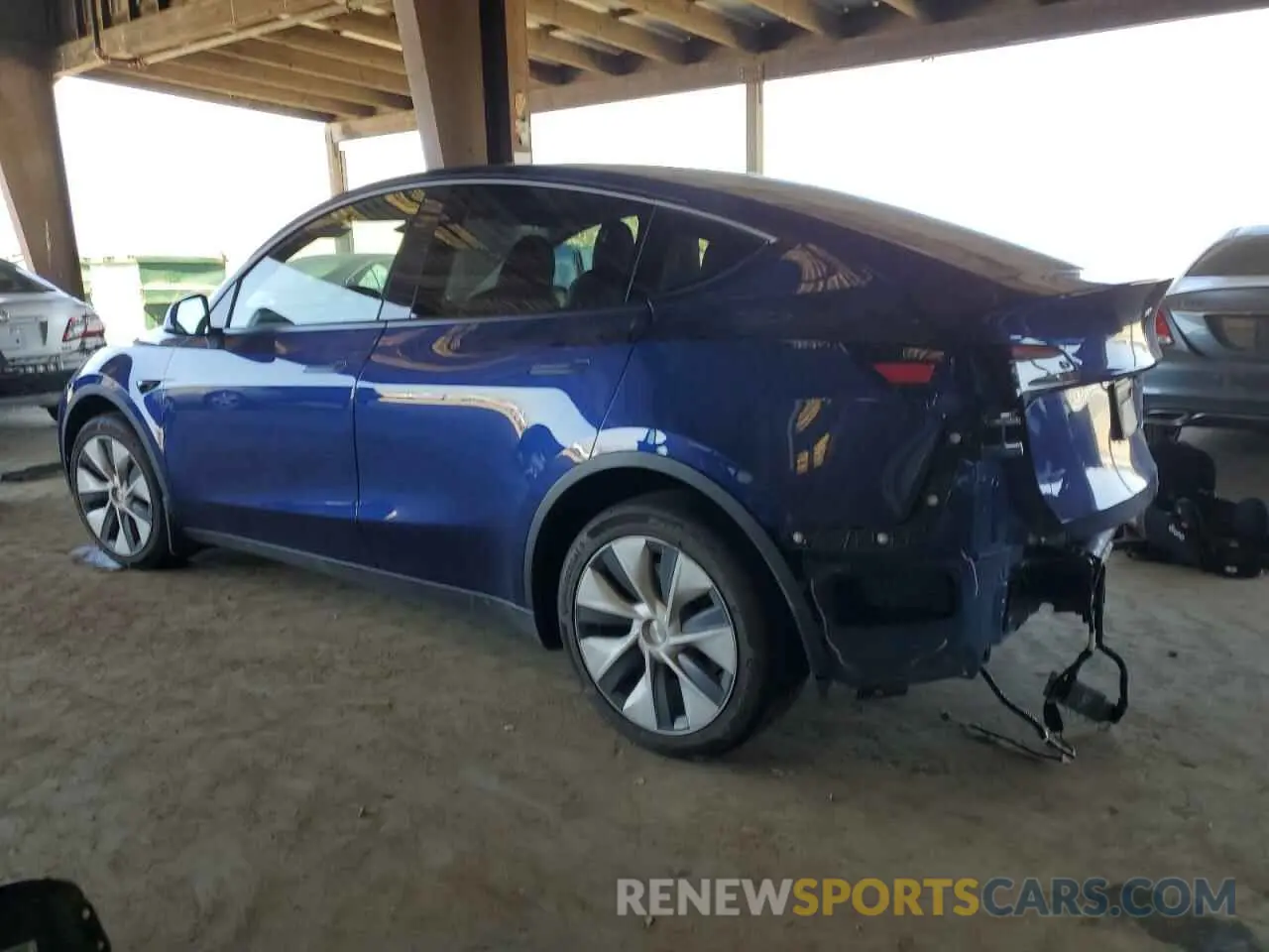 2 fotografías del automóvil dañado 7SAYGDEE0PF837470 TESLA MODEL Y 2023