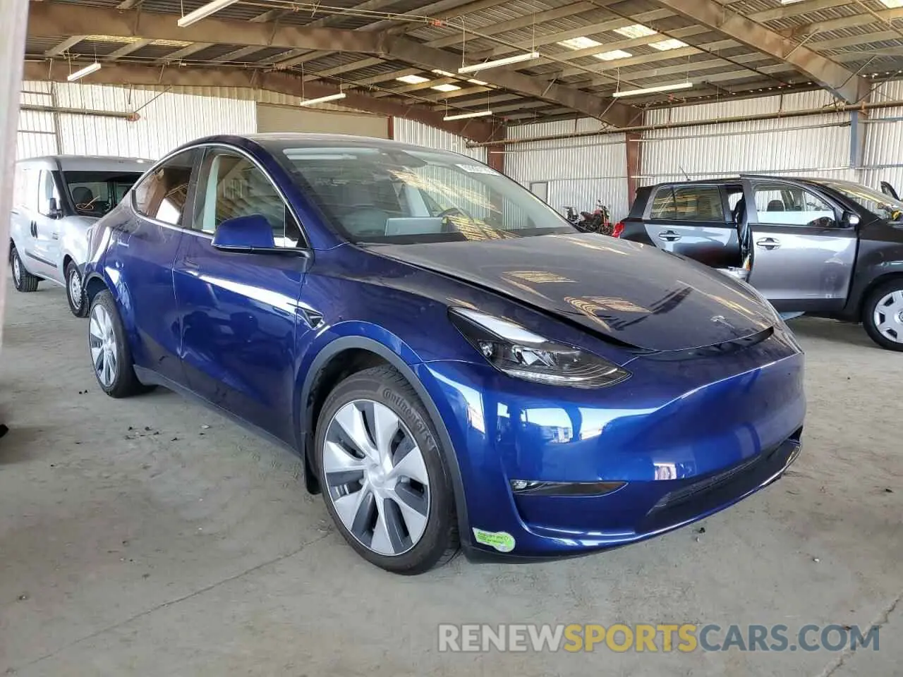 4 fotografías del automóvil dañado 7SAYGDEE0PF837470 TESLA MODEL Y 2023