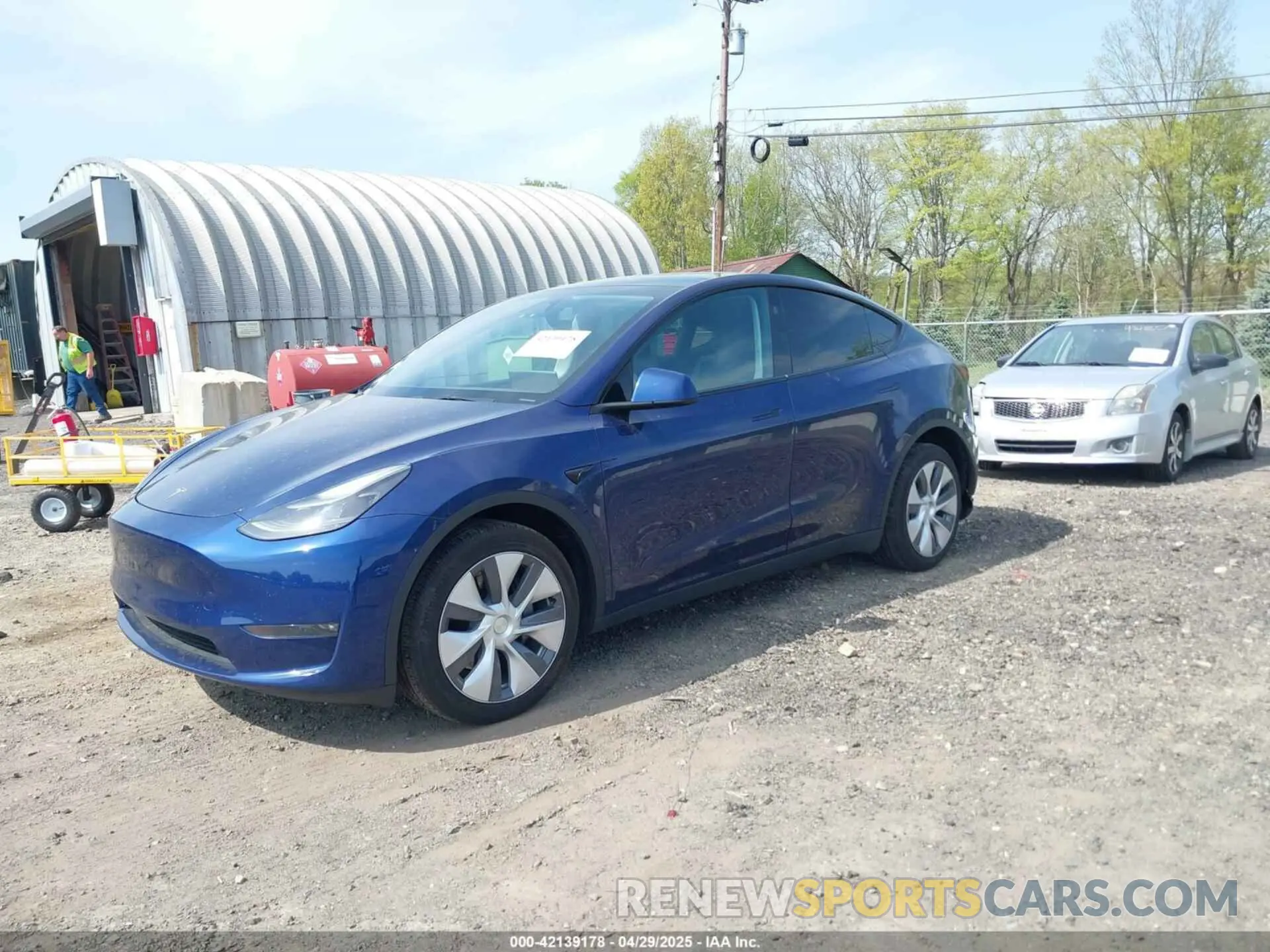 2 fotografías del automóvil dañado 7SAYGDEE0PF850980 TESLA MODEL Y 2023