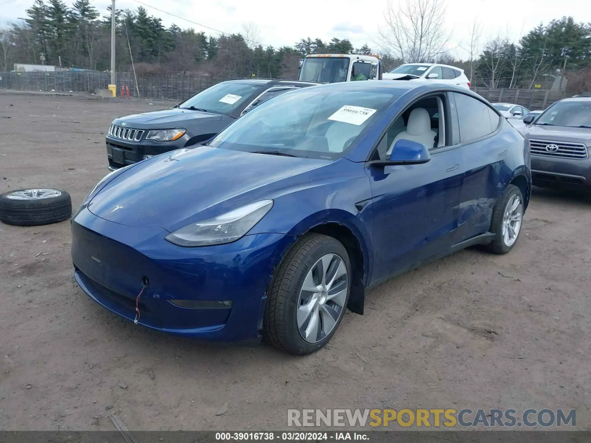 2 fotografías del automóvil dañado 7SAYGDEE0PF856651 TESLA MODEL Y 2023