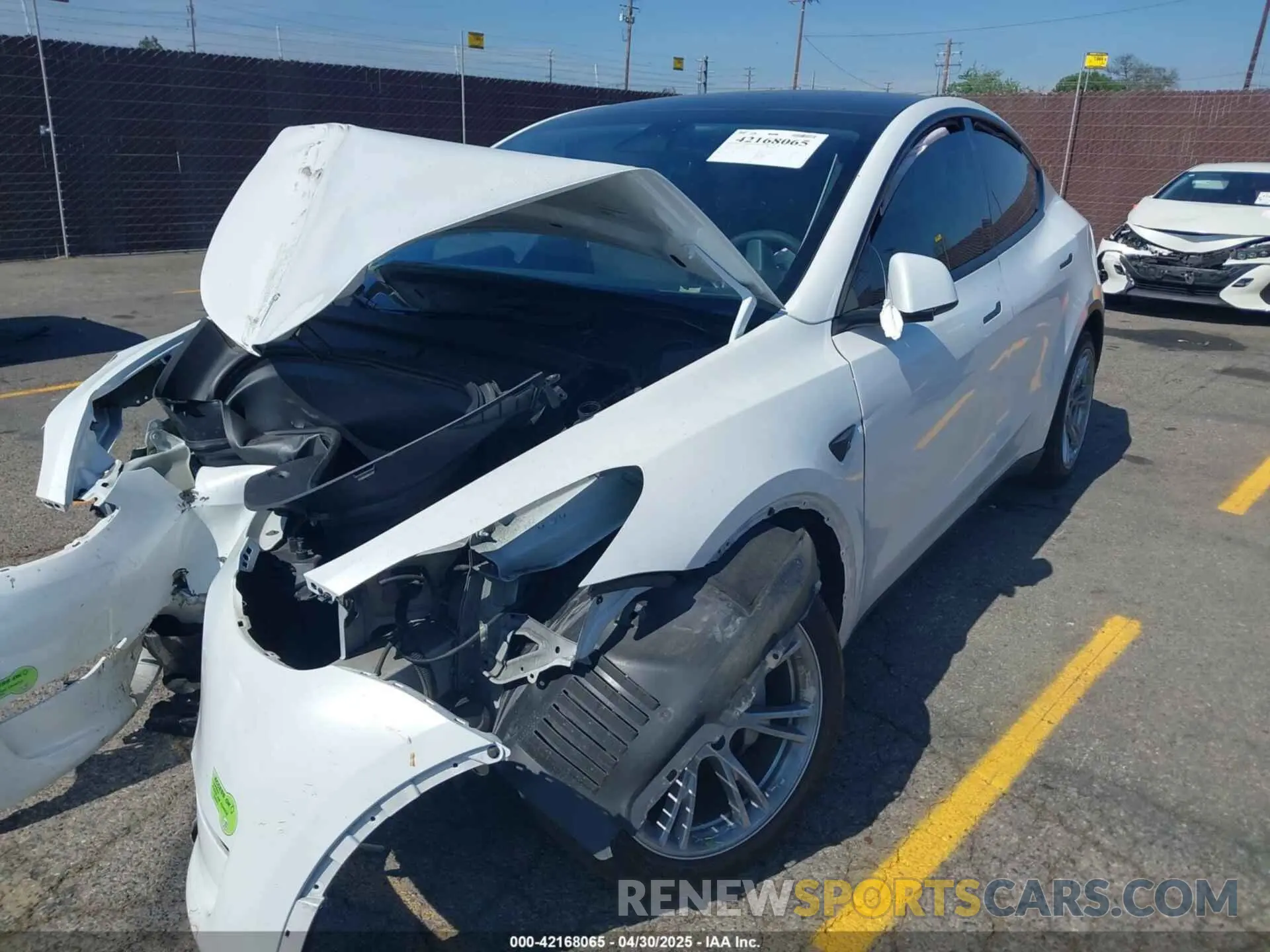 2 fotografías del automóvil dañado 7SAYGDEE1PA034664 TESLA MODEL Y 2023