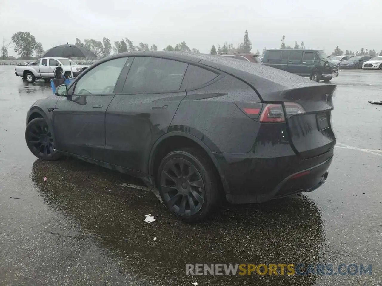 2 fotografías del automóvil dañado 7SAYGDEE1PA074971 TESLA MODEL Y 2023