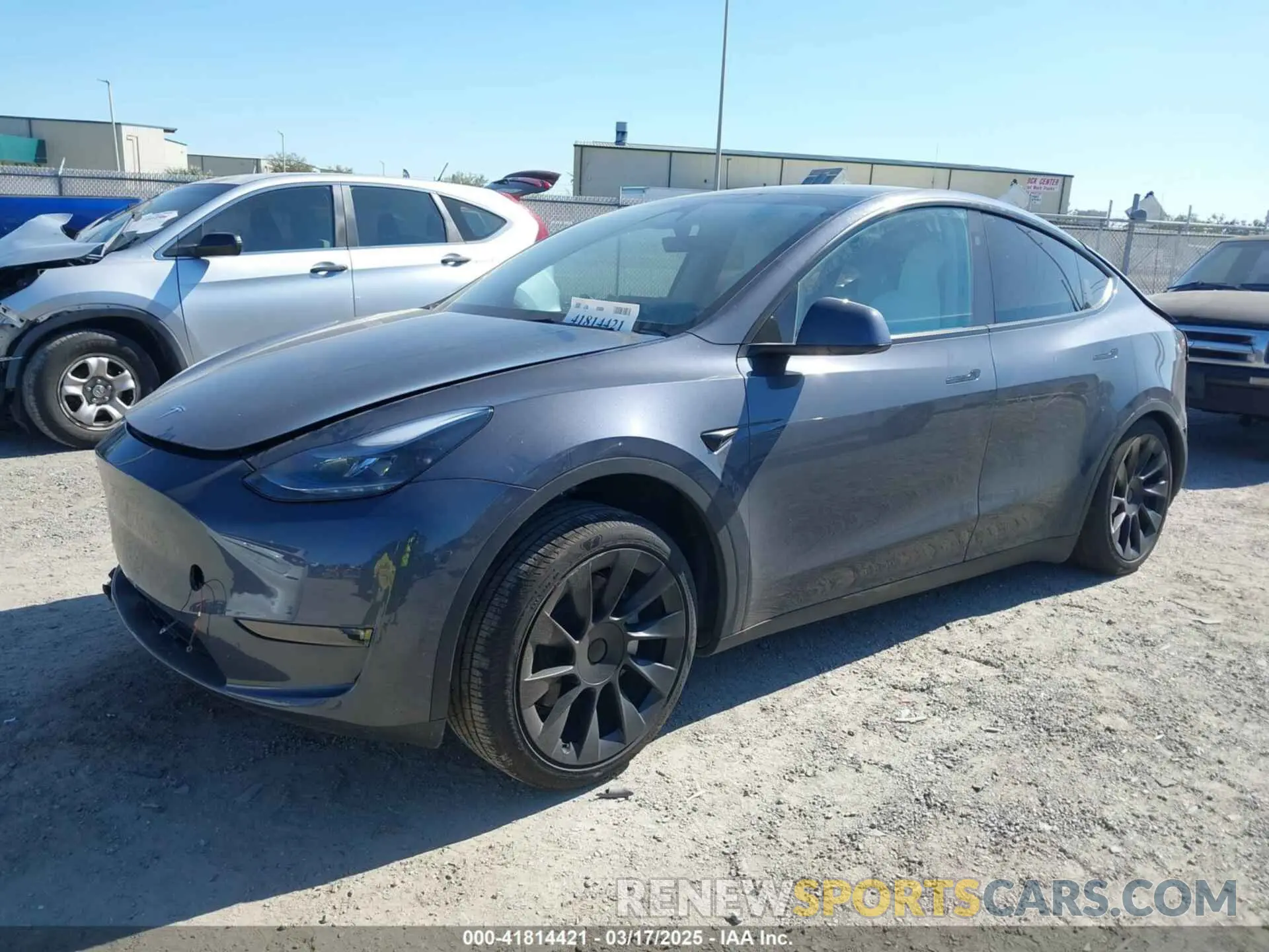 2 fotografías del automóvil dañado 7SAYGDEE1PA203937 TESLA MODEL Y 2023